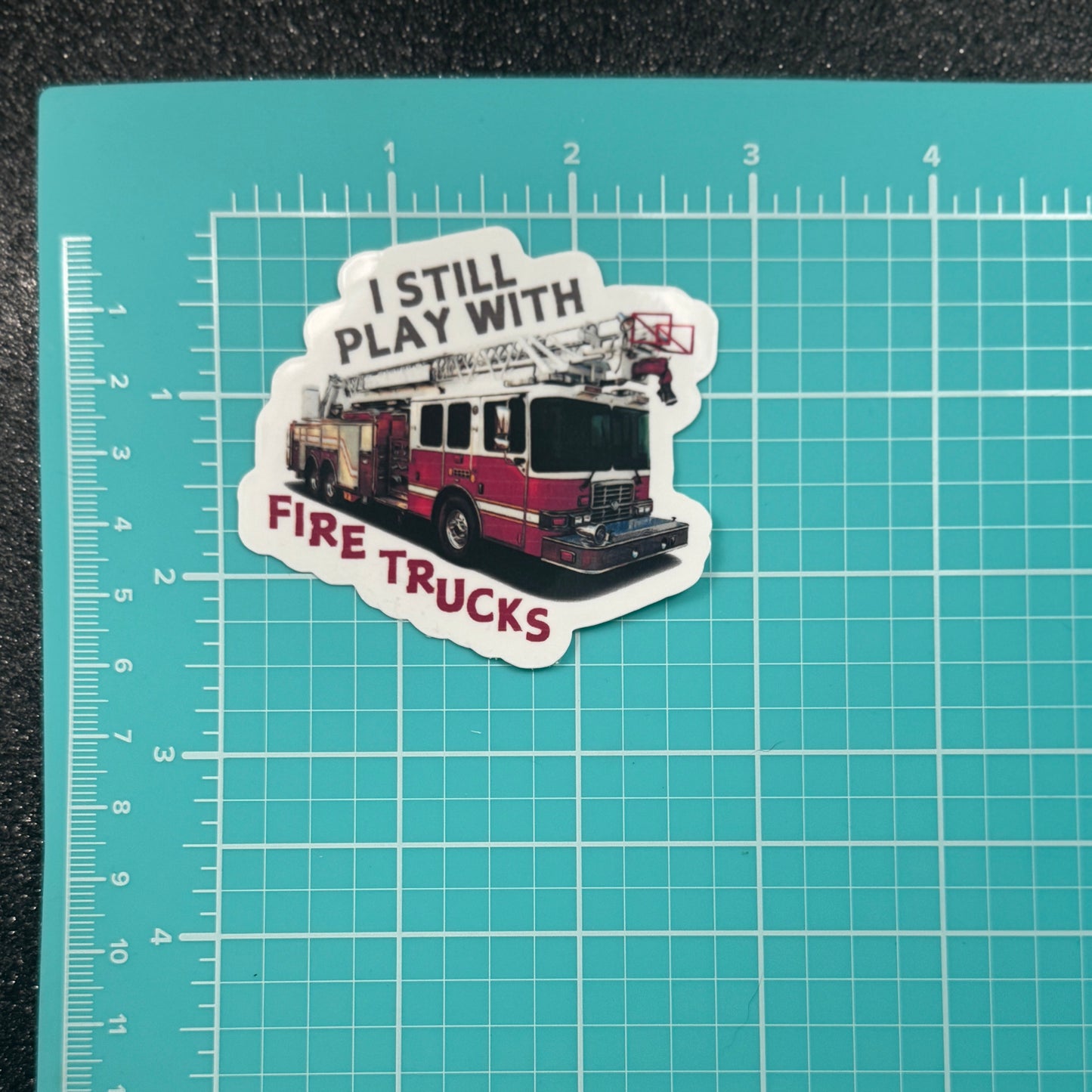 I Still Play With Fire Trucks Firefighter Sticker