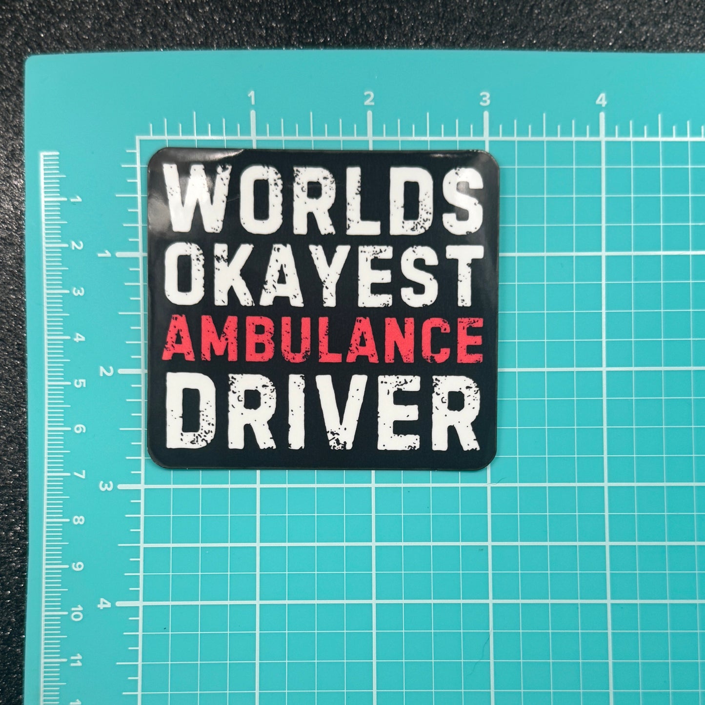 Worlds Okayest Ambulance Driver Sticker