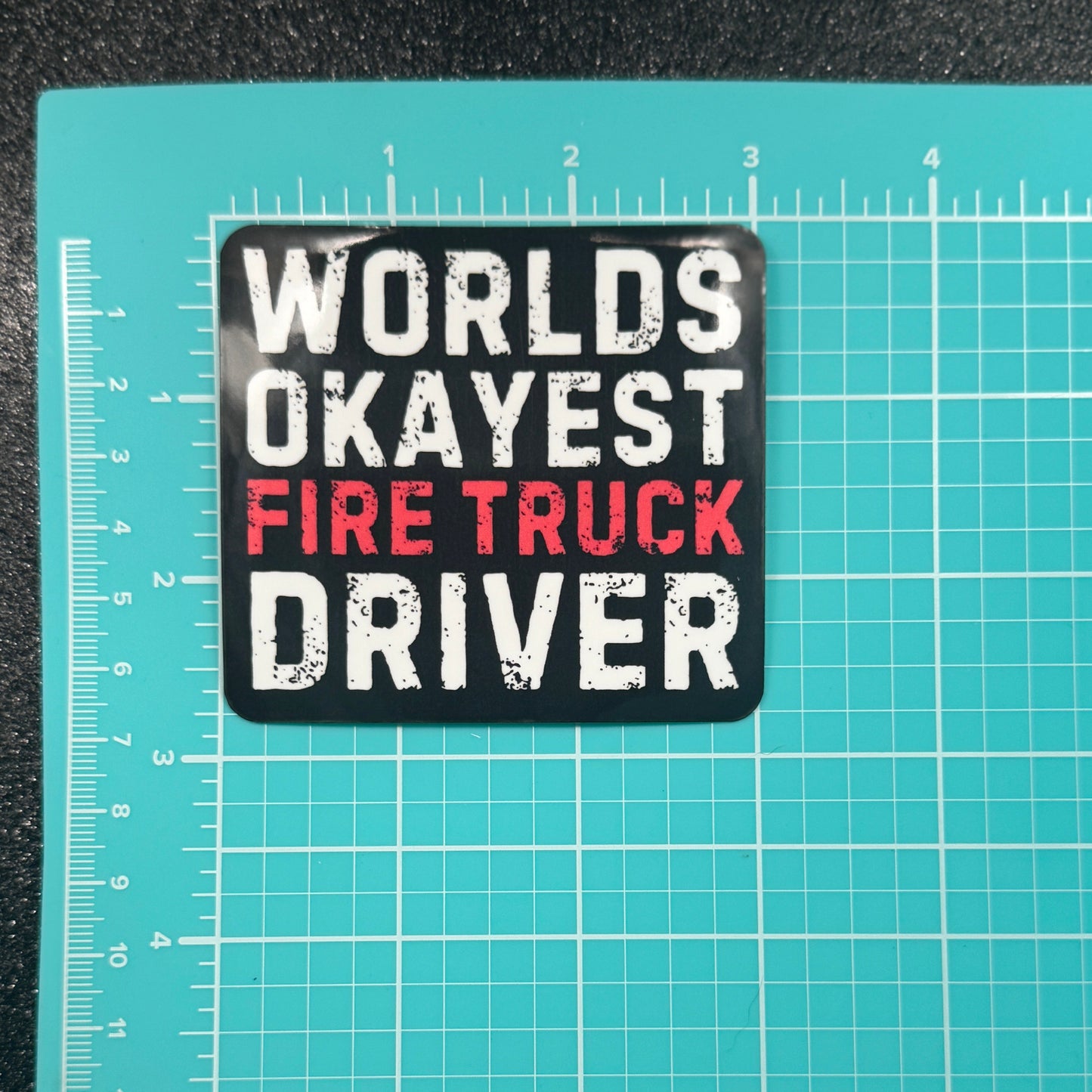 Worlds Okayest Fire Truck Driver Sticker