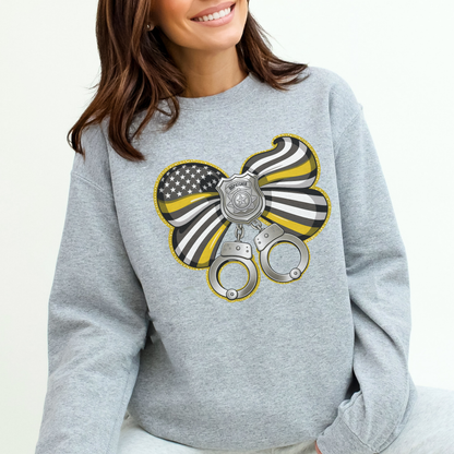 Gray sweatshirt with a graphic design featuring handcuffs and a police badge on a white background