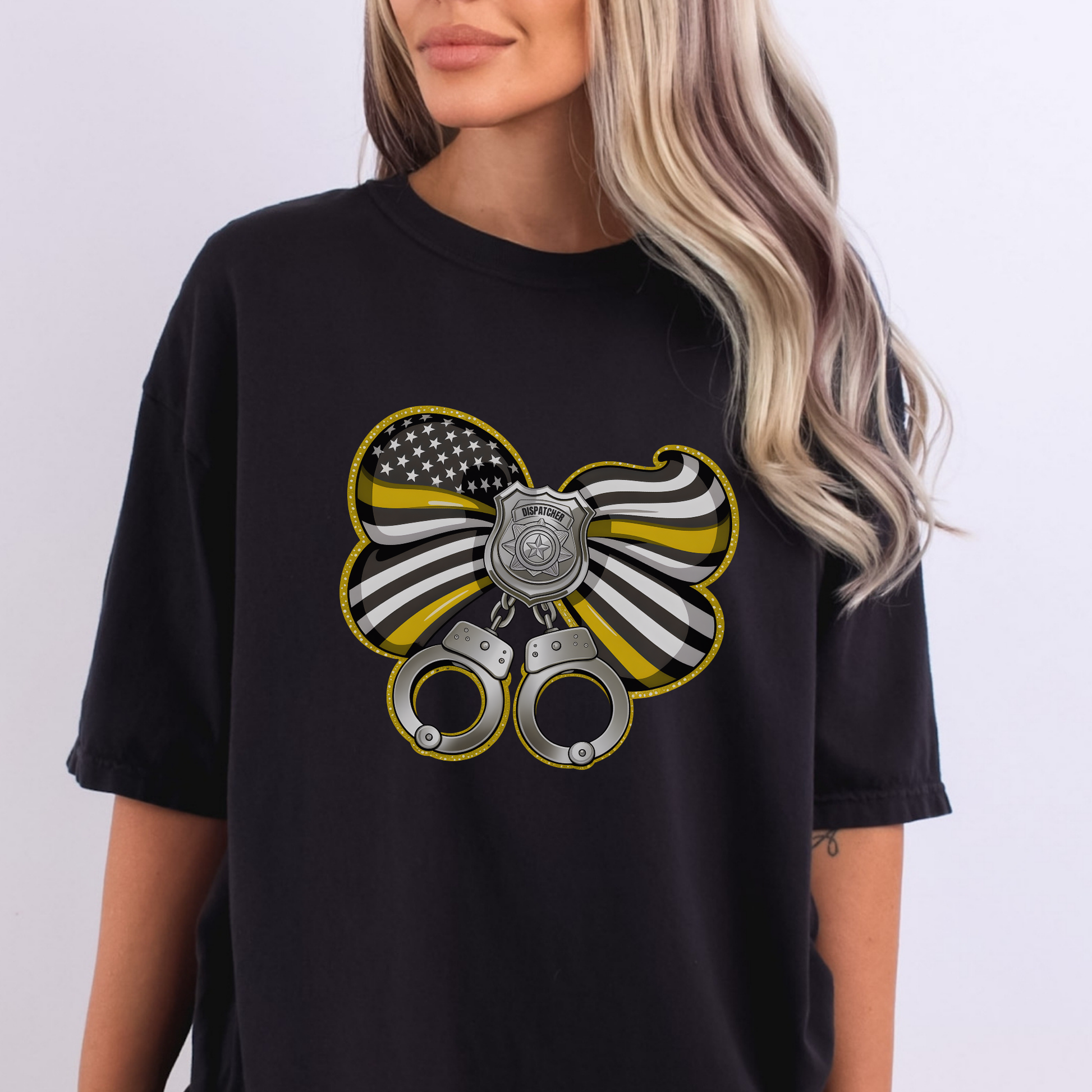 Black t-shirt with a graphic design featuring an American flag, police badge, and handcuffs on a white background.