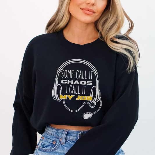 Person wearing a black sweatshirt with a humorous design and text.