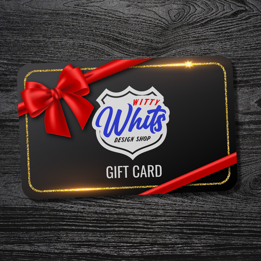 Gift card with red ribbon and Witty Whits Design Shop logo on a dark wooden background